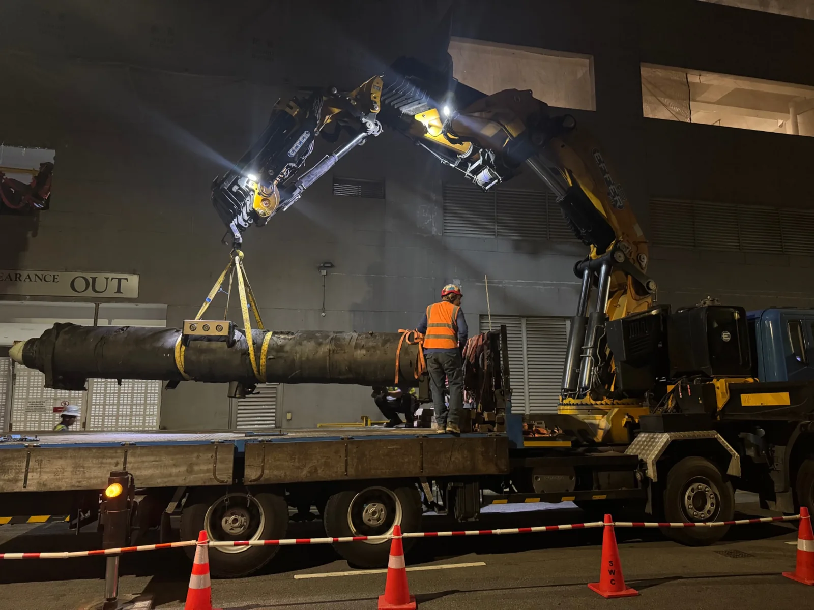 Night lifting of large industrial pipe