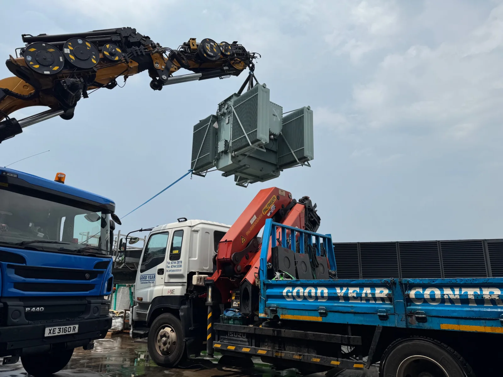 Transformer lifting using lorry cranes in Singapore