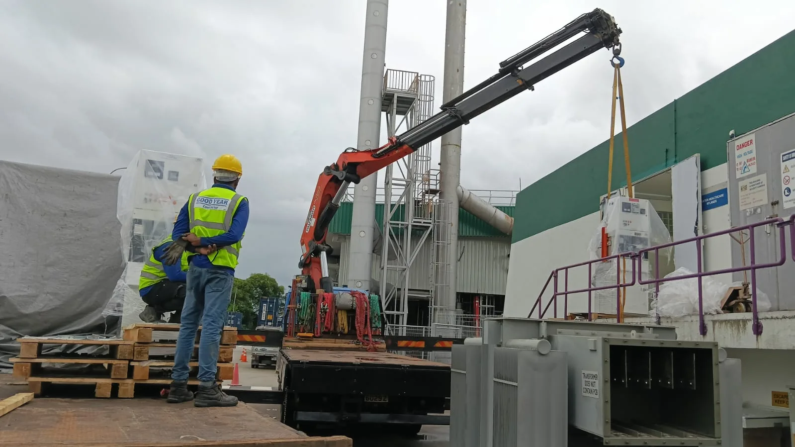 Transformer positioning using lorry crane